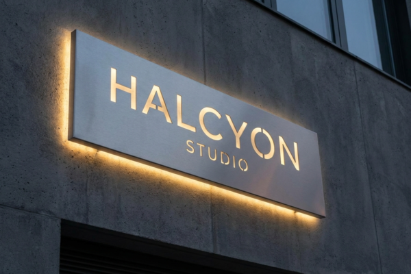 Halcyon Studio — halo-lit aluminium building sign